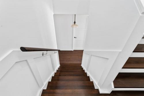 Stair case with white walls